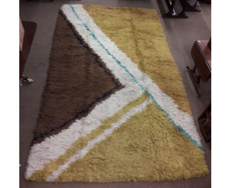 Alice Roden - 20th / 21st Century Irish A fine shag pile hand woven Rug, 100% wool, with abstract geometric design with brown