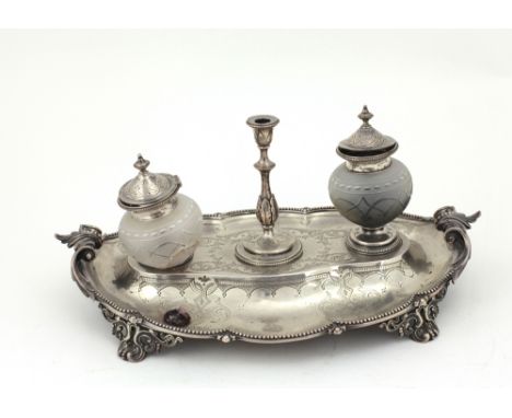 An attractive and unusual engraved silver Desk Ink Stand, with two cutglass bottles, (1 damaged) and removable candlestick, o