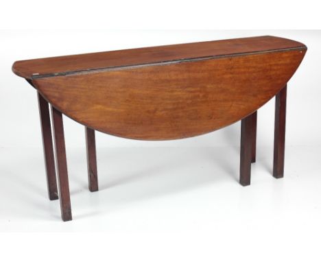 A 19th Century Irish light mahogany drop leaf Wakes or Hunt table, on square chamfered legs, approx. 152cms (5') long. (1)