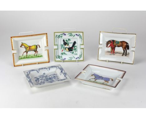 Three attractive Hermes porcelain Ashtrays, decorated with race horses, one decorated with birds, and a similar blue and whit