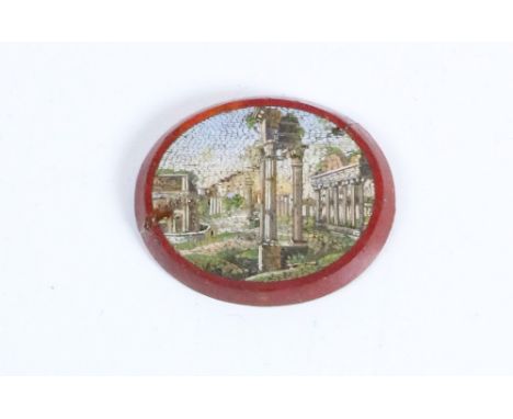 A 19th Century micro-mosaic depicting the Tivoli Gardens, Rome, approx. 2.75cms (1")h x 3.75cms (1 1/2") w, a gilt folding mo