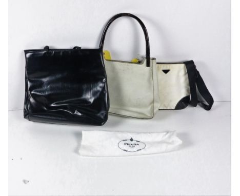 A Prada cognac decorated leather Tote, with open top and carry handles (worn) made in Italy serial No: BR0713, with authentic