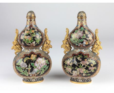 A fine pair of heavy Chinese cloisónne double gourd Vases and Covers, each profusely decorated in polychrome with birds, flow