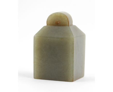A fine quality natural Hetian jade Seal, of rectangular block form with drilled arch top, 3" (7.5cms). (1)