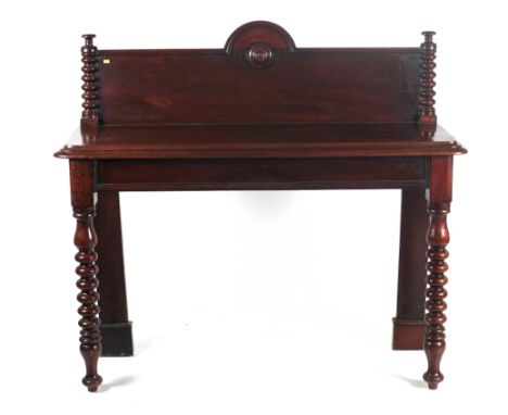 An attractive Victorian period mahogany Hall Table, of narrow proportions, the shaped back with bobbin turned pillars over a 
