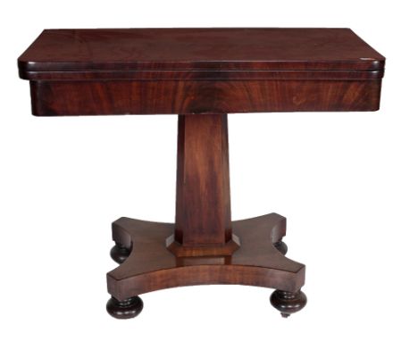 An attractive Victorian Irish mahogany fold-over Card Table, on octagonal pillar support with quatre form base terminating on