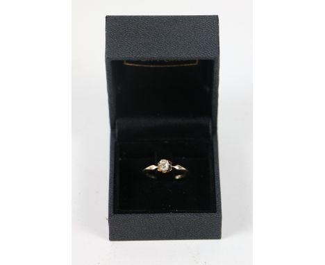 An attractive oval diamond Solitaire Ring, size M, with illusion style setting, H/Si .27ct, 1.8gms. (1)