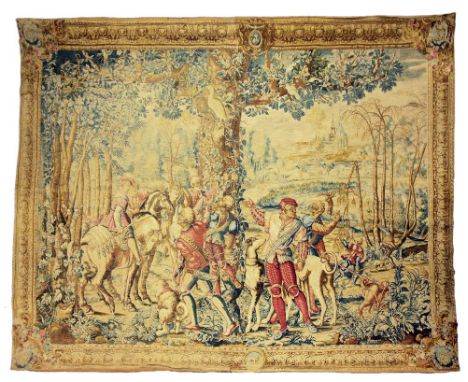 A fine quality 19th Century Aubusson Tapestry, depicting a hunting scene with warriors, figures on horseback with dogs in a r