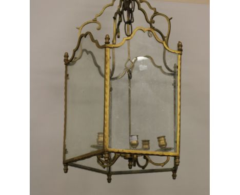 A 19th Century hexagonal brass Lantern, with five branch candle holder,  approx. 71cms (28") high. (1)