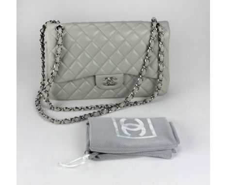 A Chanel light grey lamb skin leather double flap Handbag, with polished silver toned hardware, international crossbody strap