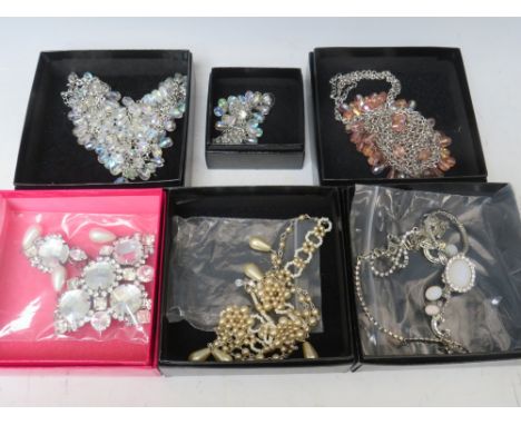 A COLLECTION OF BUTLER AND WILSON JEWELLERY ITEMS, to include a necklace and earring set, pearl effect choker, brooch - L 13 