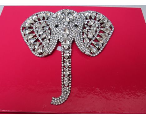 A LARGE BUTLER AND WILSON CLEAR DIAMANTE ELEPHANT BROOCH, with articulated trunk, W 11.5 cm