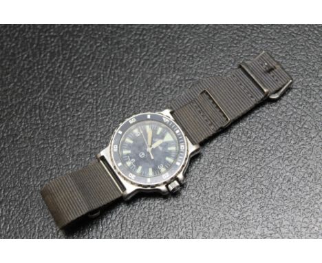 A ROYAL NAVY DIVERS WATCH BY PRECISTA, marked with rear broad arrow 6645-99 75733-14 993/88, Dia 4 cm
