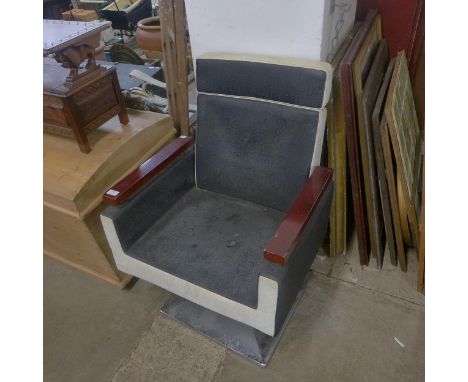 An Art Deco style barber's chair