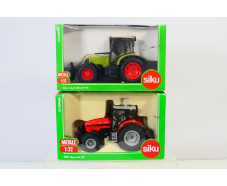 Siku - Two boxed Siku 1:32 scale diecast model tractors. Lot consists of Siku #3058 Same Iron 110; with #3256 Claas Ares 697 