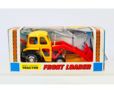 Britains - A boxed vintage Britains Massey Ferguson Front Loader Tractor # 9572. The model appears Mint in a Good box with so
