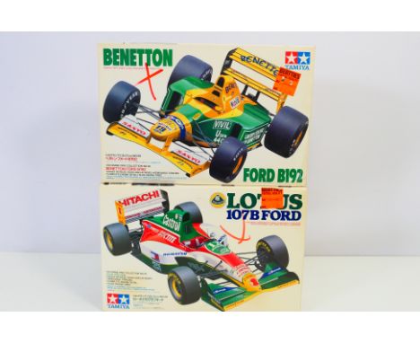 Tamiya - Two boxed 1:20 scale plastic model F1 racing car kits from the Tamiya 'Grand Prix Collection'. Lot consists of Tamiy