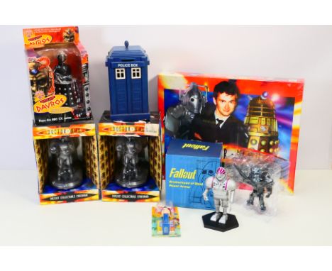 Dr Who - A group of Dr Who items including diecast Cyberman figures, a remote control Davros, a Tardis money box, a sealed Dr