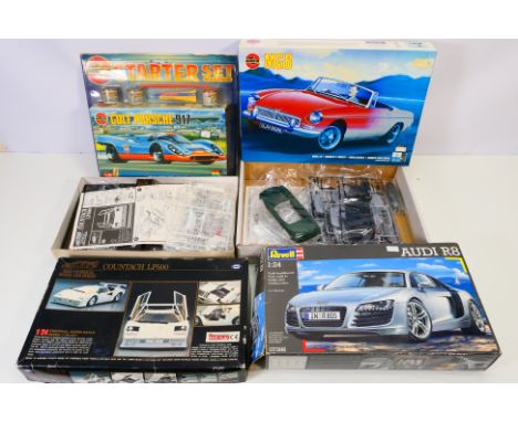 Marui - Airfix - Revell - Four boxed plastic model car kits. Lot consists of Marui 1:24 scale Lamborghini Countach; Airfix #0
