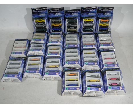 Cararama - A boxed group of multi packs of two and three diecast 1:87 scale model cars. Lot includes Saab 9-5, BMW 3 Series T