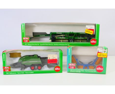 Siku - Three boxed Siku 1:32 scale diecast model farm implements. Lot consists of Siku #2062 Front Cambridge Roller; #1964 Sq