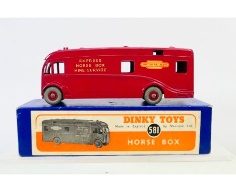 Dinky - A boxed British Railways Express Horse Box in maroon # 581. The model appears in Excellent condition with and only a 
