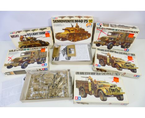Tamiya - A group of six Tamiya 1:35 scale plastic military vehicle model kits. Lot consists of Tamiya #35092 Long Range Deser