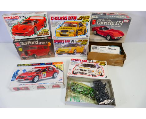 AMT - Airfix - Others - Seven boxed plastic model car kits. Lot includes Chinese made snap-together with motor Mercedes C-Cla