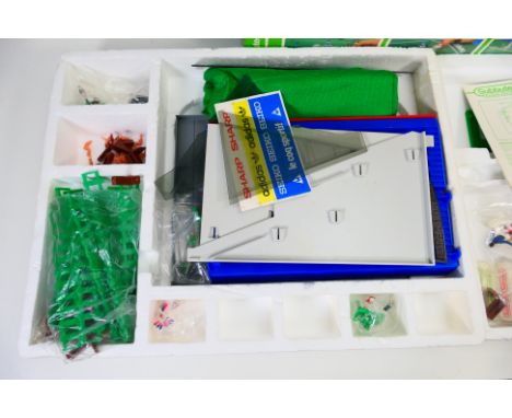 Subbuteo - A boxed Subbuteo #60250 "Grandstand Edition" two tray box set. The set comes with grandstand, pitch, accessories a