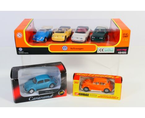 Corgi - Cararama - A group of boxed VW models, a vintage Corgi Beetle 1200 in orange and white with round hole Whizzwheels # 