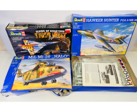 Revell - Three boxed Revell plastic military aircraft model kits. Lot consists of #04703 1:32 Hawker Hunter FGA.9 / Mk.58; #0