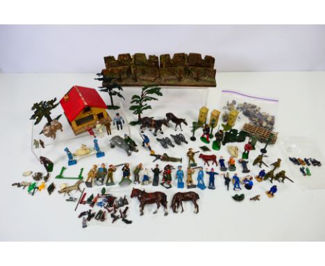 Dinky - Britains - A collection of metal figures and animals, trees, lamp posts, a building and some army defence dioramas. T