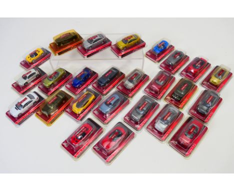 Yatming - A boxed group of 25 diecast vehicles in 1:72 scale models. Lot includes Volkswagen W12 Nardo, Alfa Romeo 156 GTA, O