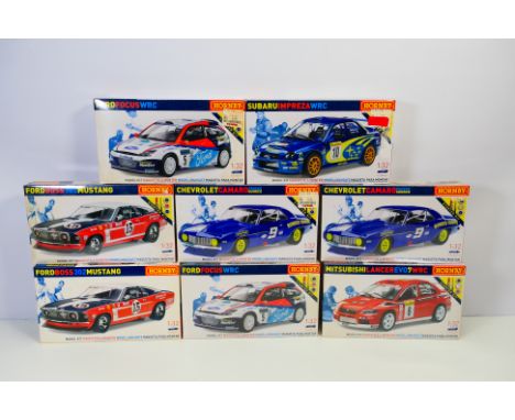 Hornby - Eight boxed 1:32 scale plastic model car kits from Hornby. Lot includes Hornby K2001 Subaru Impreza WRC; #K2001 Ford