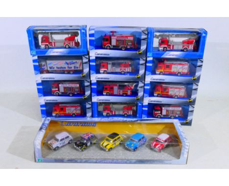 Cararama - A boxed group of 13 Cararama diecast/plastic 1:80 scale models trucks. Lot include fire engines, truck and 5 car m