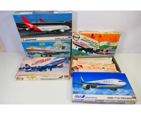 Hasegawa - Five boxed 1:200 scale plastic commercial aircraft model kits from Hasegawa. Lot includes Hasegawa #10182 'Qantas'