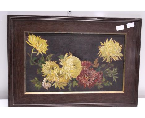A oil on panel in a oak frame 