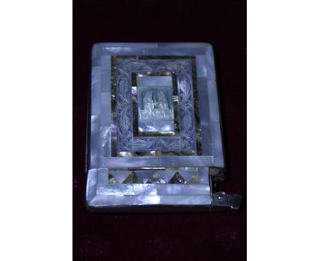 A vintage MOP cigarette case &amp; lighter combination 