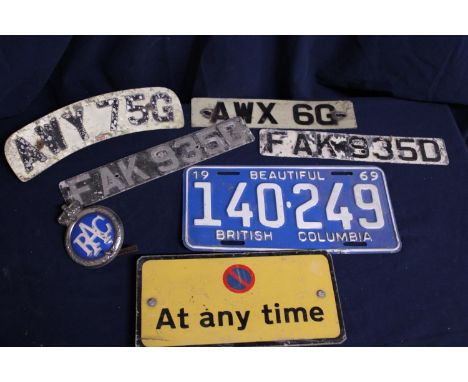 A selection of assorted vintage registration plates &amp; other items 