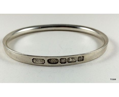 A solid silver hallmarked bangle 
