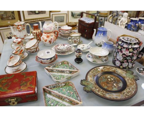 A quantity of Oriental ceramics, to include a Japanese part tea service, Chinese porcelain bowls, dishes, a small wooden stan