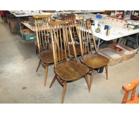 Four Ercol style stick back chairs