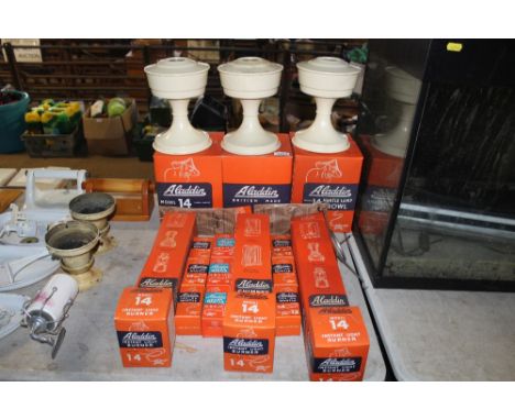A quantity of Aladdin Model No.14 oil lamp parts in original box to include bowls, chimneys, light burners etc. 