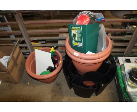 Two plastic water butt stands; various large plastic plant pots; knee pads; compost caddy etc