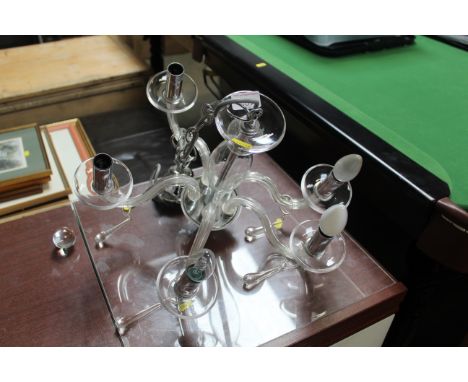 A glass five branch ceiling light