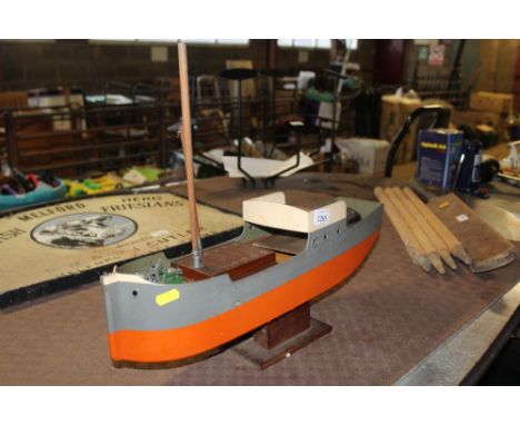 A model boat with part motorised engine (incomplete)