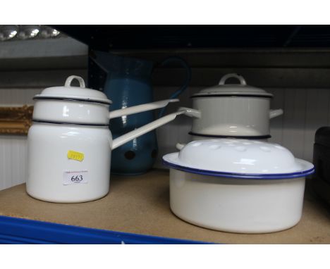 A collection of enamel ware to include steamer; jug etc