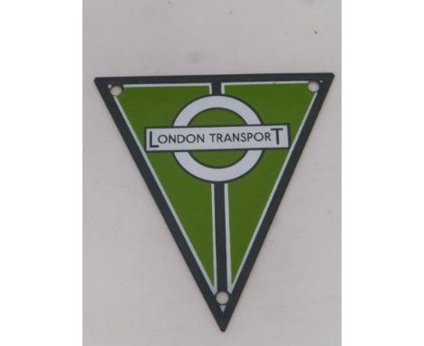 A London Transport triangular enamel RT country buses radiator badge. 