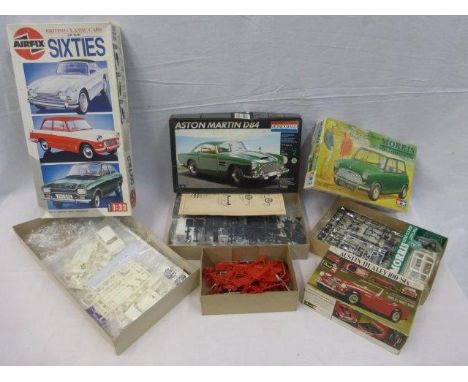 Four boxed model kits including a boxed Revell Austin Healey 100/6. 