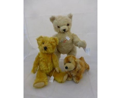 Two Knickerbocker USA teddy bears and a USA Zone soft toy dog. 